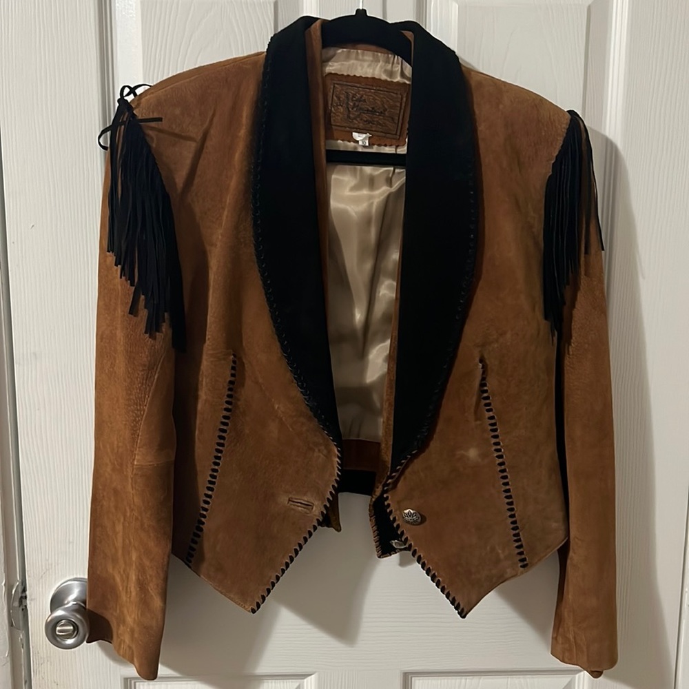Jacket and vest combo. Gently worn. Size 10